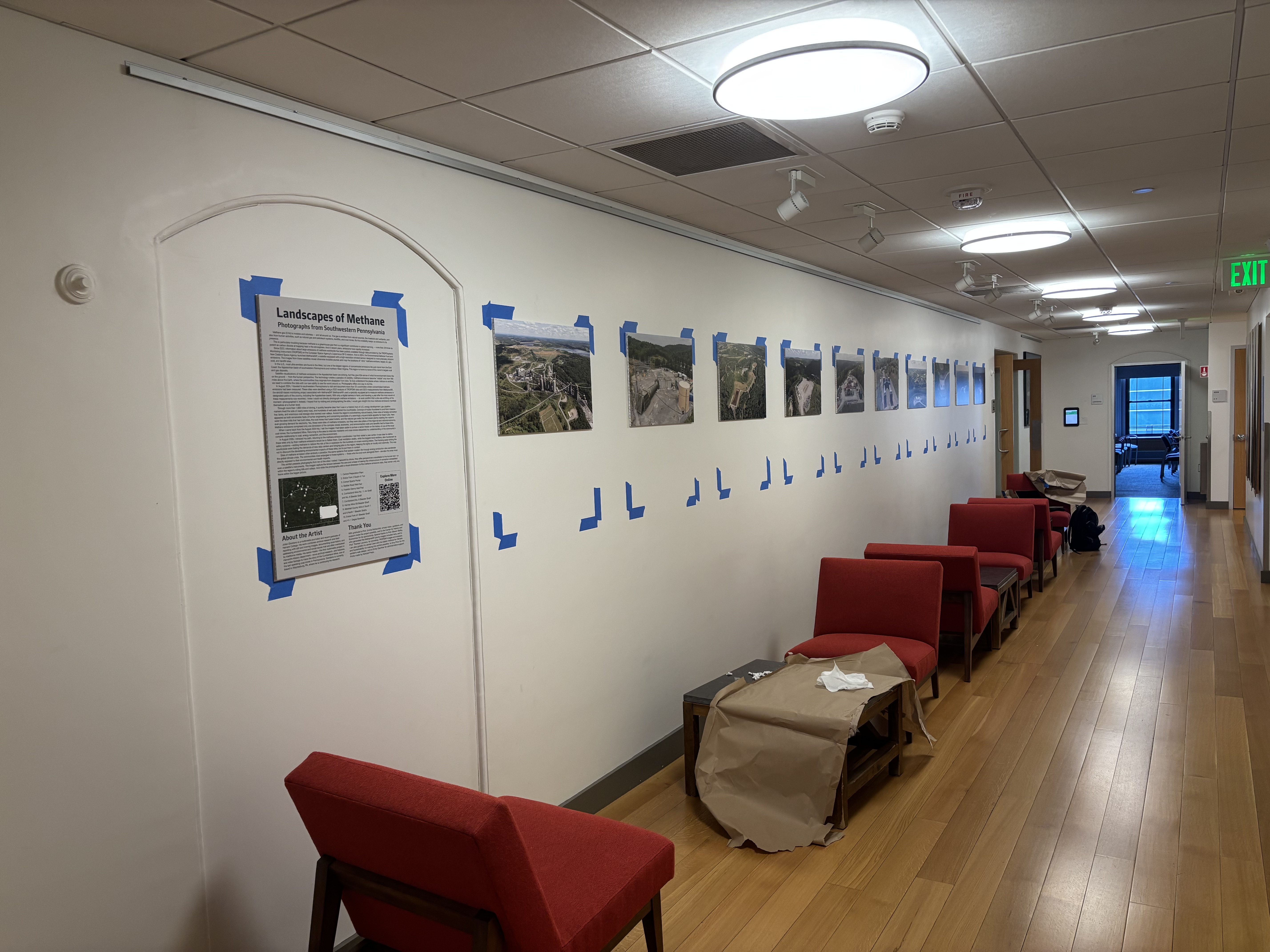 A laser level and some painter’s tape helped with installing the exhibit in the Harvard University Center for the Environment.